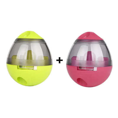 Two colorful plastic toys, one green and one pink, on a white background.