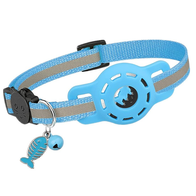 Blue pet collar with a fish charm on a white background