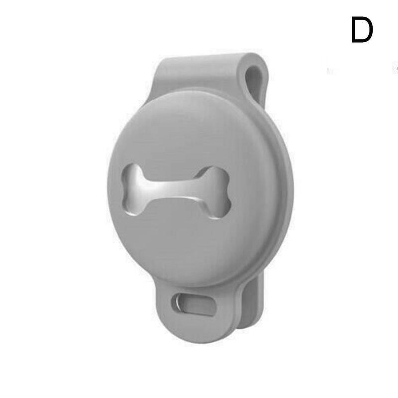 Gray plastic clip with a central hole on a white background