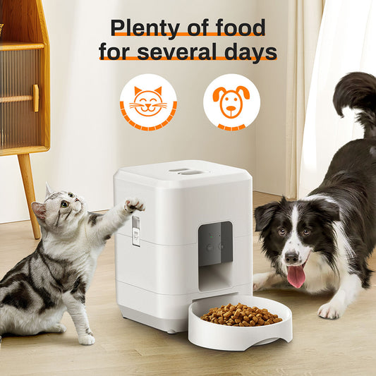 Automated pet feeder with a cat and dog interacting, labeled 'Plenty of food for several days'.